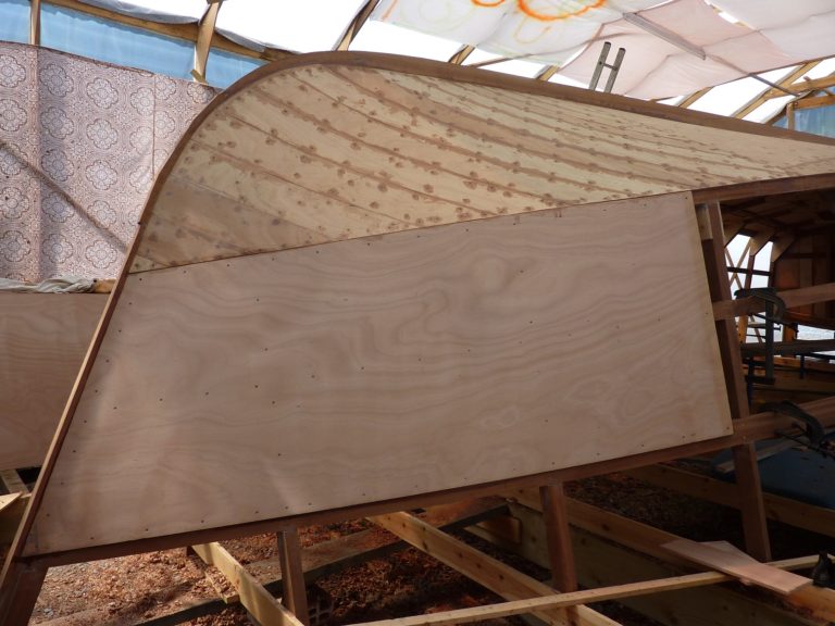 Plate 7 4 Starting to lay the plywood on the side of the hull 1 768x576