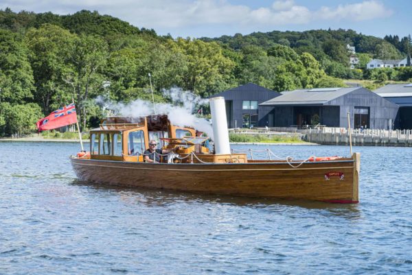 Heritage boat Osprey at Windermere Jetty. Visitors can take a trip aboard this 117 year old vessel scaled 1 600x401